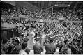 Image of The Beatles onstage at the Seattle Center Coliseum, August 21, 1964