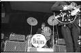Image of Ringo Starr playing drums during the Beatles concert at Seattle Center Coliseum, August 21, 1964
