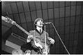 Image of Paul McCartney singing during Beatles concert, Seattle Center Coliseum, August 21, 1964