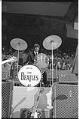 Image of Ringo Starr performing at the Beatles concert in Seattle Center Coliseum, August 21, 1964