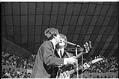 Image of Paul McCartney and John Lennon singing at the Beatles concert, Seattle Center Coliseum, August 21, 1964