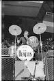 Image of Ringo Starr performing at the Beatles concert at Seattle Center Coliseum, August 21, 1964