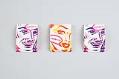 Image of Three condom packs from the Northwest AIDS Foundation, ca. 1992