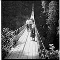 Image of Izzy Smith on the Capilano Suspension Bridge, Vancouver, British Columbia, circa 1950