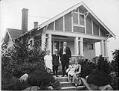 Image of Swedish-American family on porch of house, circa 1925