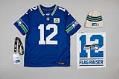 Image of Bill Nye’s jersey, cap, towel, and badge from 12th man flag raising, Nov. 19, 2023