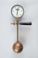 Image of Prop for demonstrating absolute zero, made of a metal toilet float, 1990s