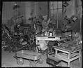 Image of Men working in Salvation Army toy repair shop, 1937
