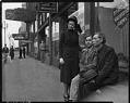 Image of Salvation Army worker with two men, May 1940