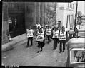 Image of Demonstrators with signs outside Seattle Chamber of Commerce during WPA strike, Seattle, 1937