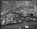 Image of Full downtown parking lot during Christmas shopping season, Seattle, 1954