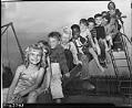 Image of Children on slide at Yesler Terrace playground, Seattle, 1942