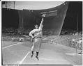 Image of Seattle Rainiers outfielder Bill Matheson jumping to catch a ball, Seattle, 1944