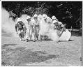 Image of Madrona air raid wardens drilling with gas masks, August 1942