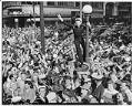 Image of Sailor climbing lamppost on V-J Day, Seattle, August 14, 1945