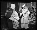 Image of Sailors kissing girls on V-J Day, Seattle, August 14, 1945