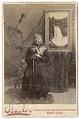 Image of Kikisoblu (Princess Angeline) with painting of Snoqualmie Falls, Seattle, 1890