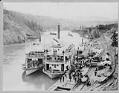 Image of Three steamboats at the Miles Canyon tramway, circa 1898