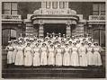 Image of Providence Hospital nurses standing on front steps, circa 1911