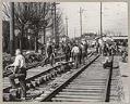 Image of Relief project crew working on streetcar tracks, March 12, 1934