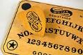 Image of Ouija board with pointer, ca. 1917