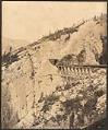 Image of White Pass & Yukon Route train, trestle, and tunnel, circa 1899