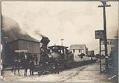 Image of Locomotive hauling powder through Skagway, circa 1902