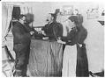 Image of Weighing gold at the Jo Jo Hotel, circa 1900