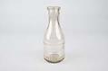 Image of Carnation Milk bottle used by William Myers in his butcher shop on 2nd and Cherry, and in Georgetown, ca. 1900