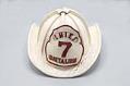 Image of Chief Battalion 7 fireman's helmet presented to Olympic Hotel manager Frank Hull, 1936