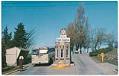 Image of Bus driving through south gate at Fort Lawton, Seattle, circa 1960