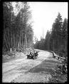 Image of Car on highway between Seattle and Tacoma, 1916