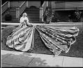 Image of Woman with large American flag, probably in Seattle, circa 1917