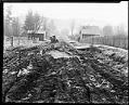Image of Car stuck on a muddy road, circa 1924
