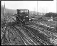 Image of Car stuck on muddy road, circa 1927