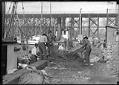 Image of Fishermen checking nets at  Fisherman's Terminal, Seattle, circa 1918