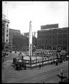 Image of Pioneer Square decorated for Potlatch, 1911