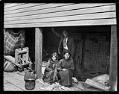 Image of Native American family camping near the waterfront, circa 1912