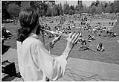 Image of Flute player at Earth Day gathering in Seward Park, Seattle, April 1971