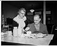 Image of Mrs. E.T. Schaal and Howard Graham working on ceramics at the Handicapped Center, Seattle, January 23, 1958