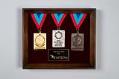 Image of Display set of medals made by Jostens for the Seattle Goodwill Games, 1990