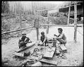Image of Igorot pipe makers in exhibit at Alaska-Yukon-Pacific Exposition, Seattle, 1909