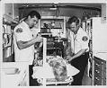 Image of Medics and patient model inside Medic One unit, Seattle, 1971