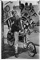 Image of Joe Kochanowski on his homemade bike at protest concerning the Burke-Gilman trail extension, Seattle, March 3, 1988