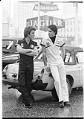 Image of Two men modeling jumpsuits, Seattle,  December 1975