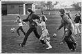 Image of Woodland Sizzlers girls soccer team practice with coaches, Seattle, November 20, 1976
