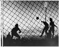 Image of Seattle Sounders and San Jose Earthquakes players in silhouette at Highline Stadium, Burien, April 11, 1975