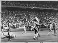 Image of Seattle Sounder Gordon Wallace leaping onto teammate Geoff Hurst after scoring a goal in playoffs, Seattle, August 18, 1976