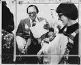 Image of Foster parents John and Lana Mitsules with baby Thi Dung Hanh at SeaTac Airport, SeaTac, April 6, 1975