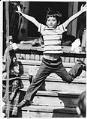 Image of Lê Quốc Thân leaping off the porch of his foster home, Renton, April 8, 1975